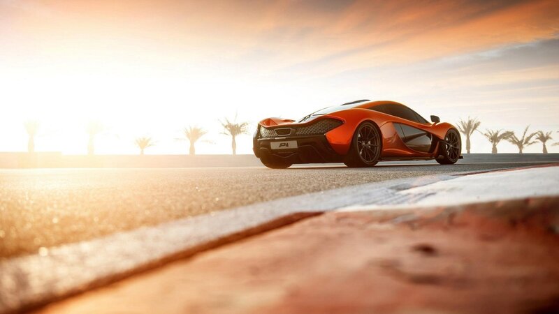 Orange sports car on track