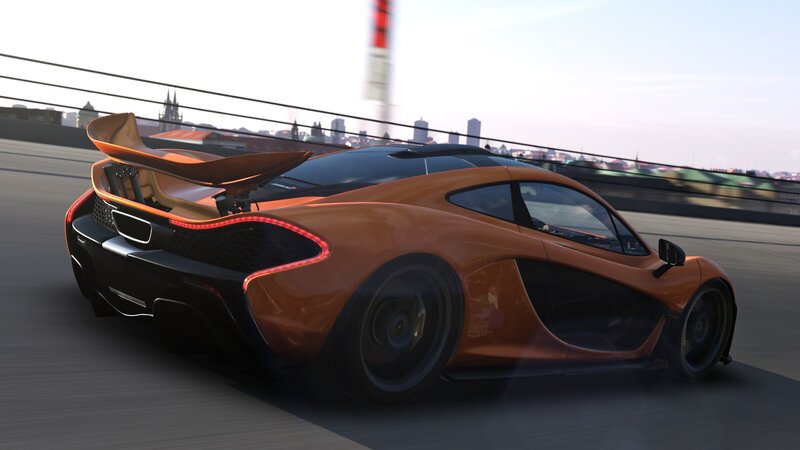 orange sports car on track