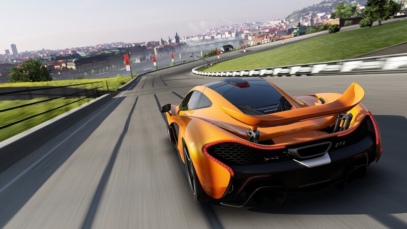 orange sports car on track
