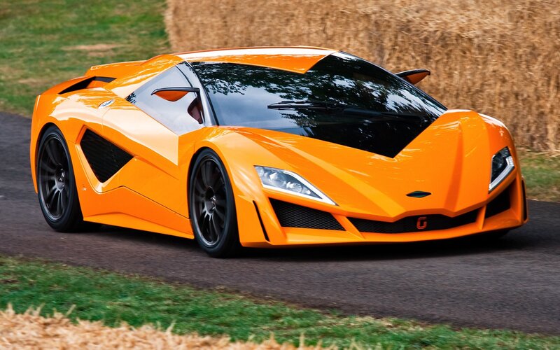 orange sports car on track