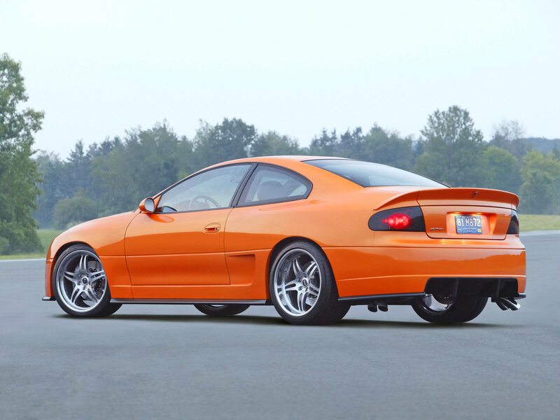 orange sports car on track