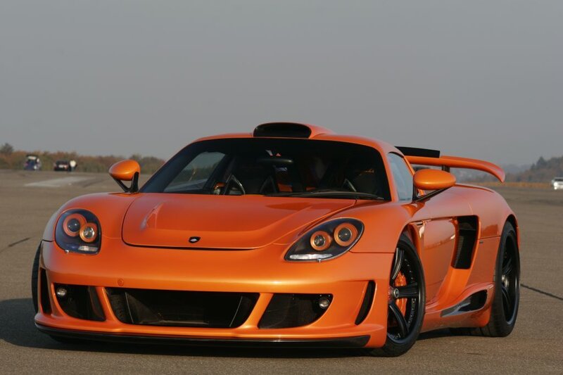 orange sports car on track