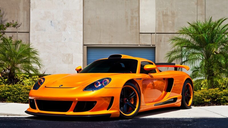 orange sports car parked outside