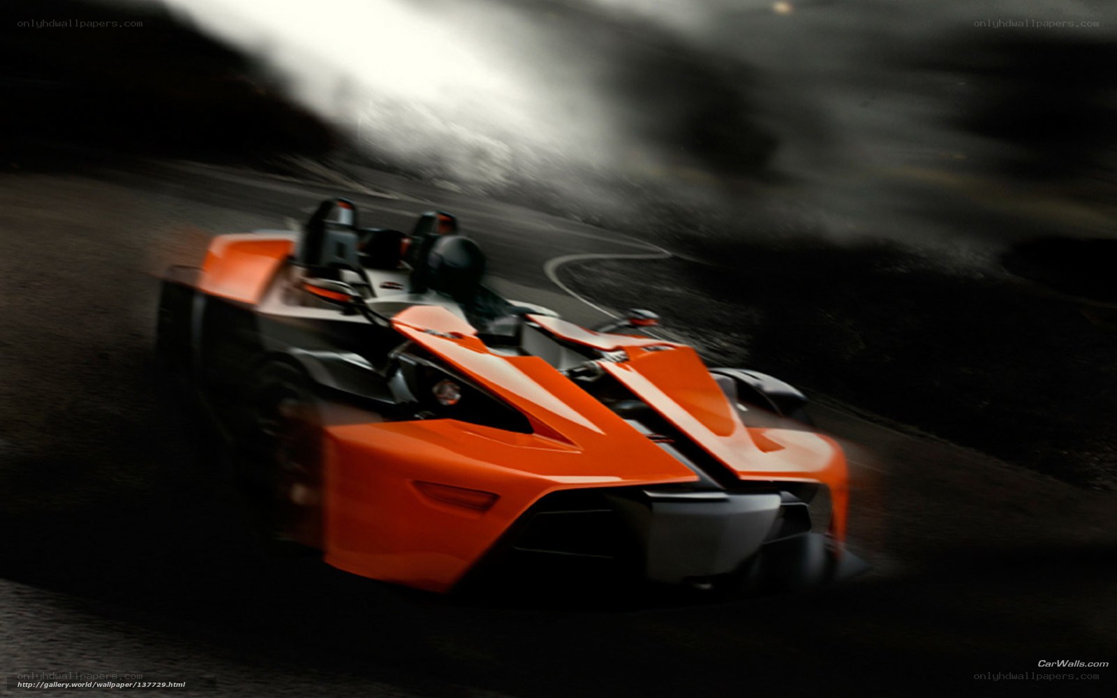 orange sports car racing