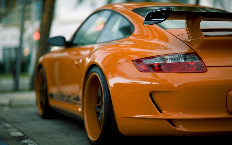 Orange sports car rear view