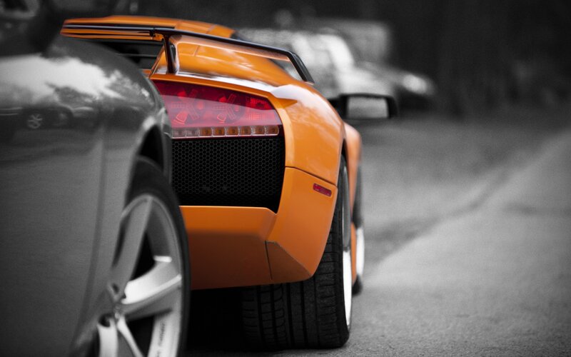 orange sports car rear view