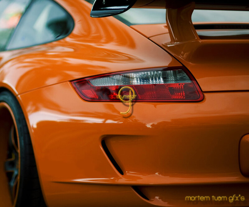 orange sports car rear view