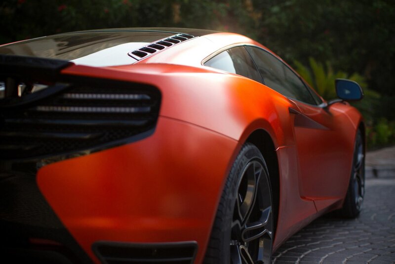 orange sports car rear view