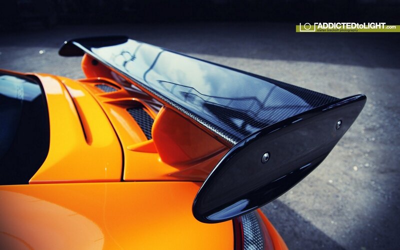 orange sports car rear wing