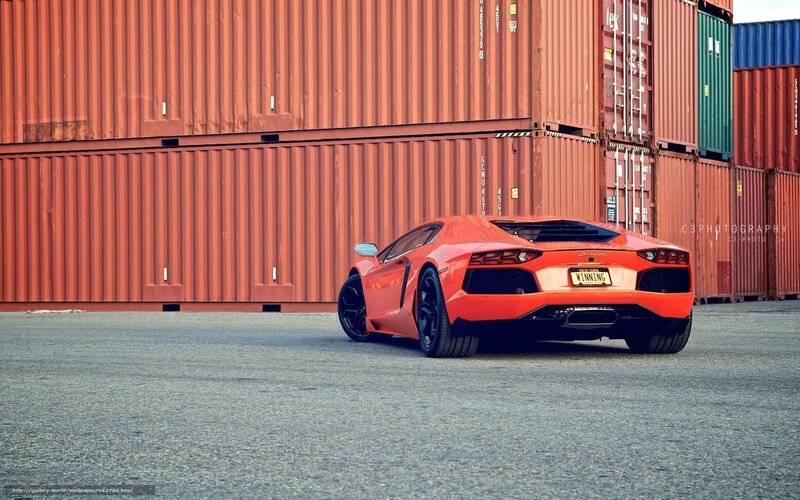 Orange Sports Car — Red, Dramatic, Afternoon, Photograph, Shipping Containers