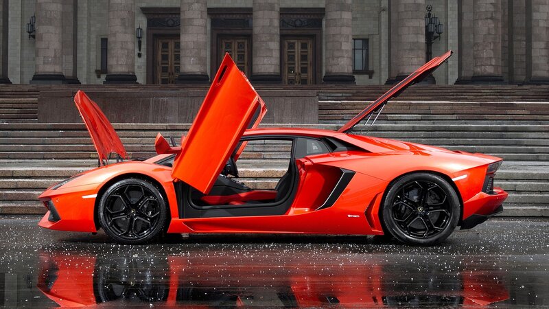 Orange Sports Car — Red, Dramatic, Photograph, Building, Stairs