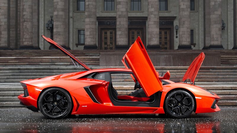 Orange Sports Car — Red, Dramatic, Photograph, Building, Steps, Doors