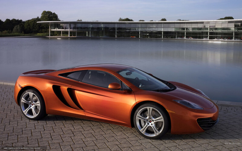 Orange Sports Car — Serene, Afternoon, Photograph, Building