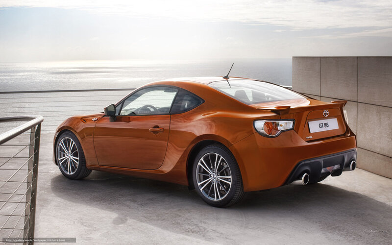 Orange Sports Car — Serene, Afternoon, Photograph, Ocean