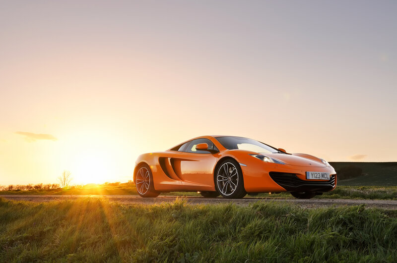 Orange Sports Car — Serene, Sunrise, Photograph, Grass