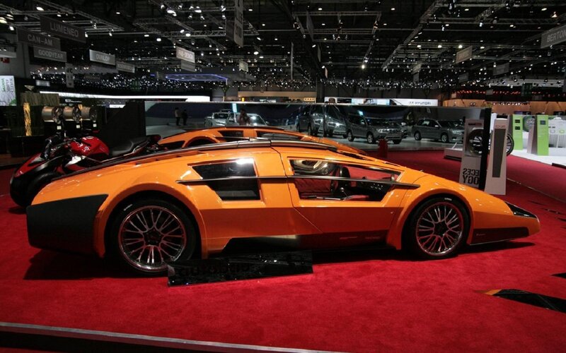 Orange Sports Car — Showroom, Night