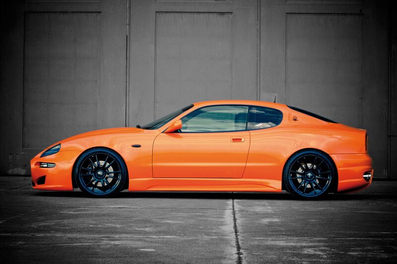 orange sports car side profile
