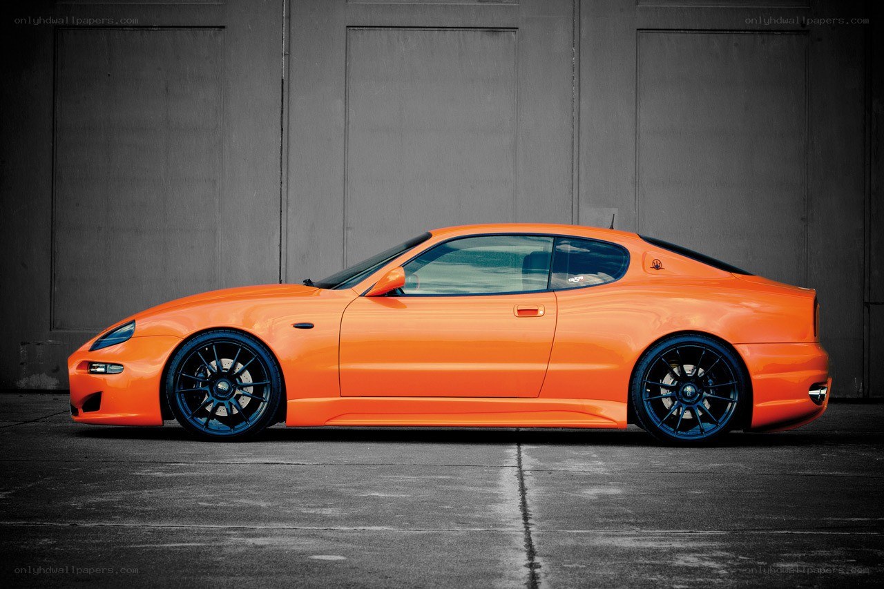 orange sports car side profile