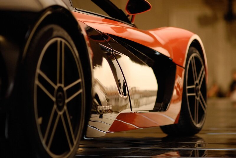 orange sports car side view