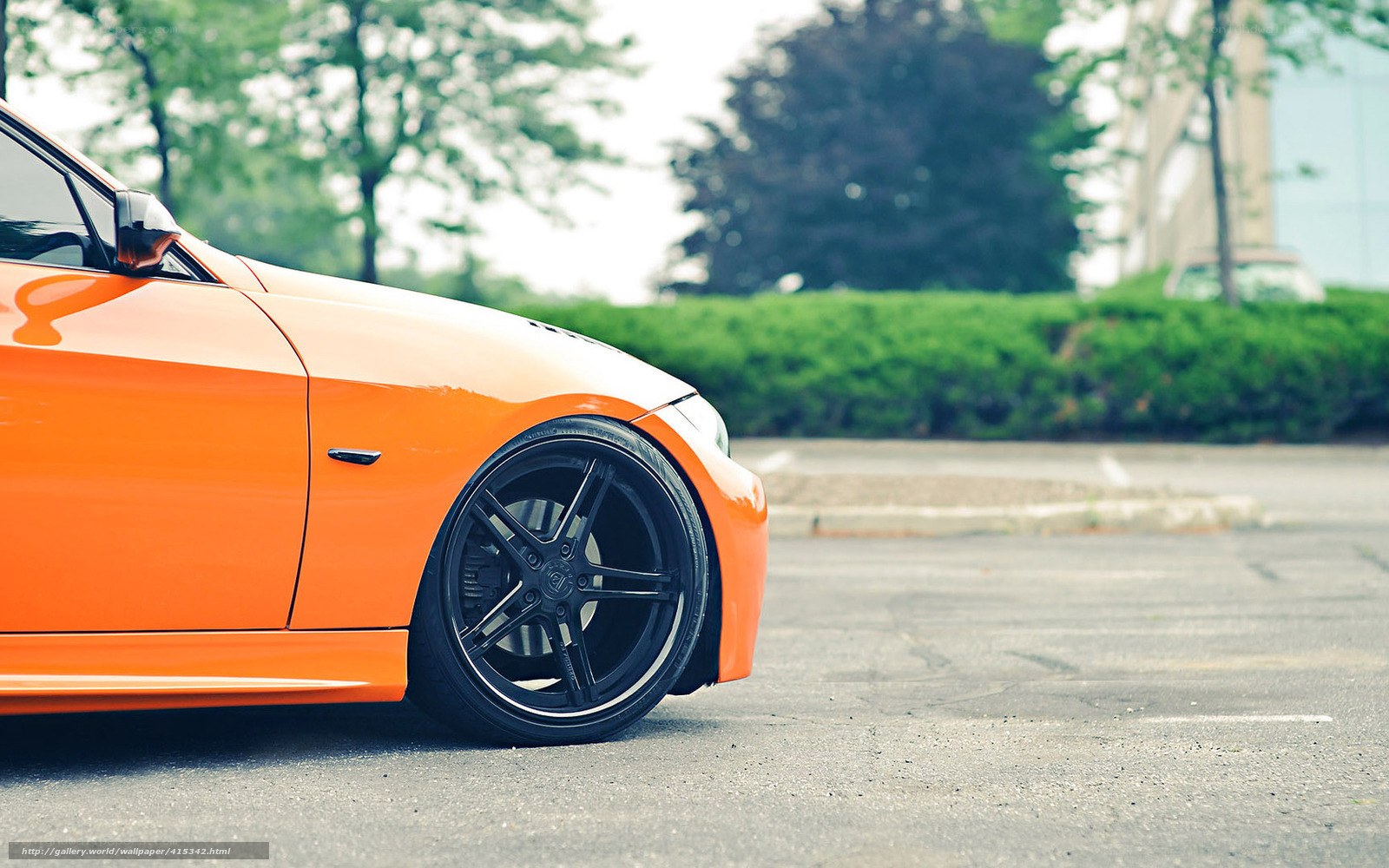 orange sports car side view