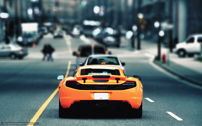 Orange Sports Car — Urban, Night