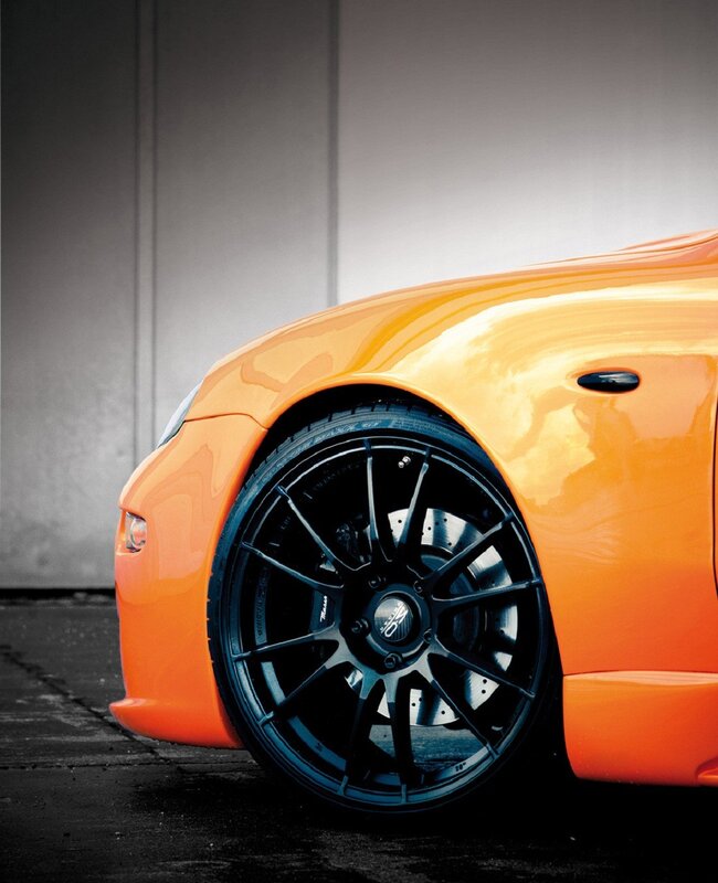orange sports car wheel