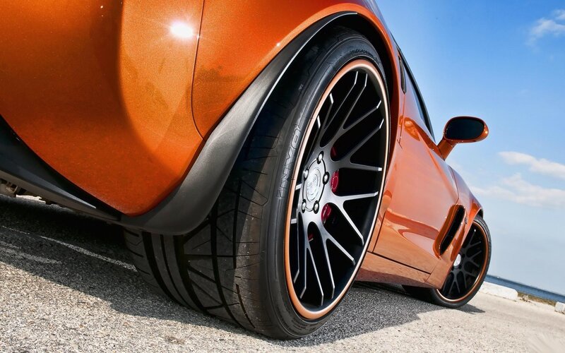 Orange Sports Car Wheel — Dramatic, Afternoon
