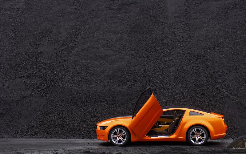 Orange sports car with open door