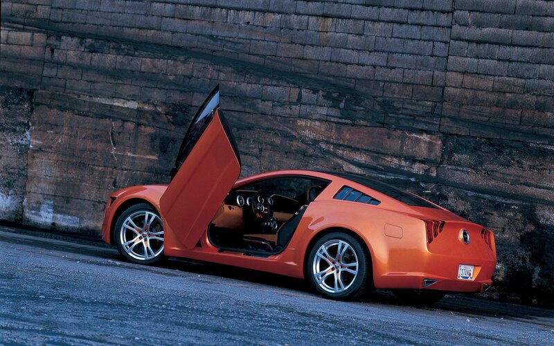 Orange sports car with open door