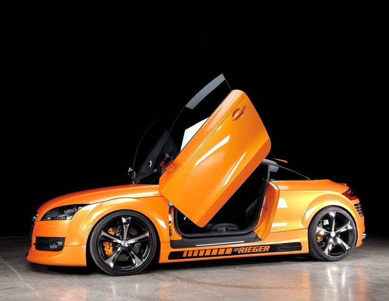 Orange sports car with open door