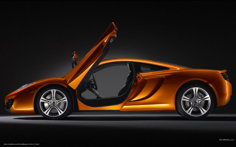 orange sports car with open door