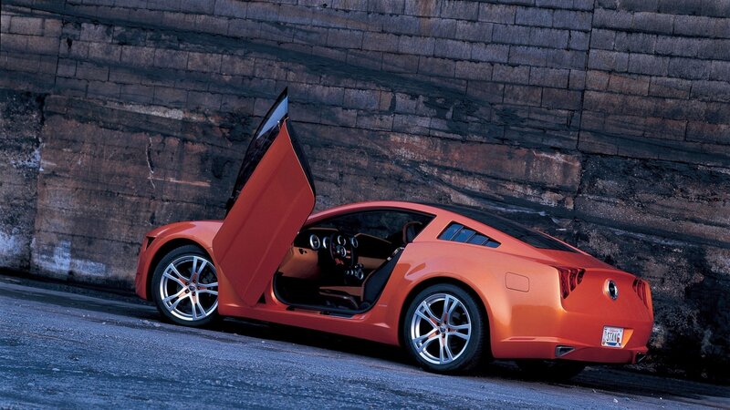 Orange sports car with open door