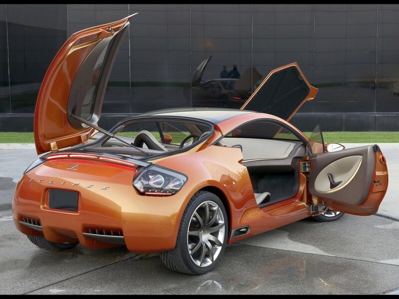 Orange sports car with open doors
