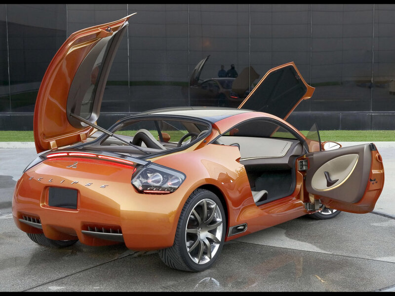 Orange sports car with open doors