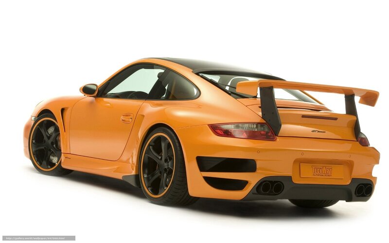 orange sports car with rear wing