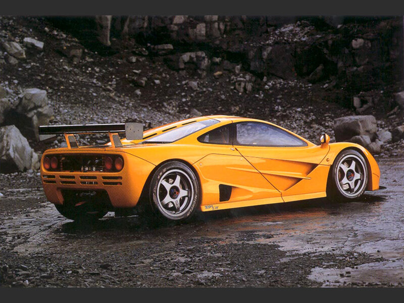 Orange Sports Car — Yellow, Dramatic, Photograph, Rocky Terrain
