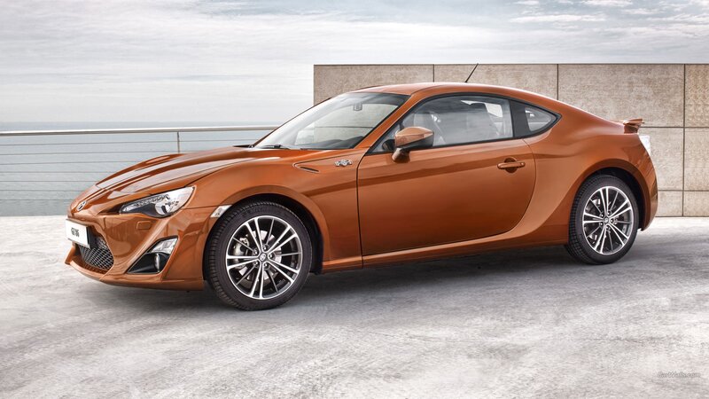 orange sports coupe car