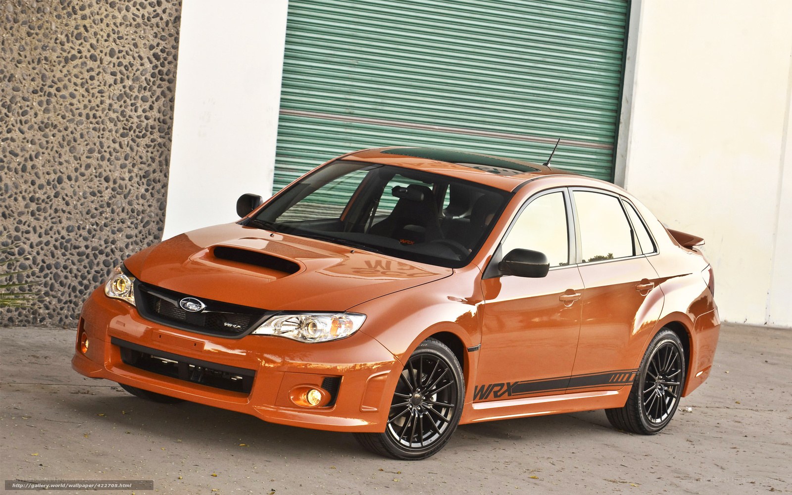 orange subaru wrx sedan