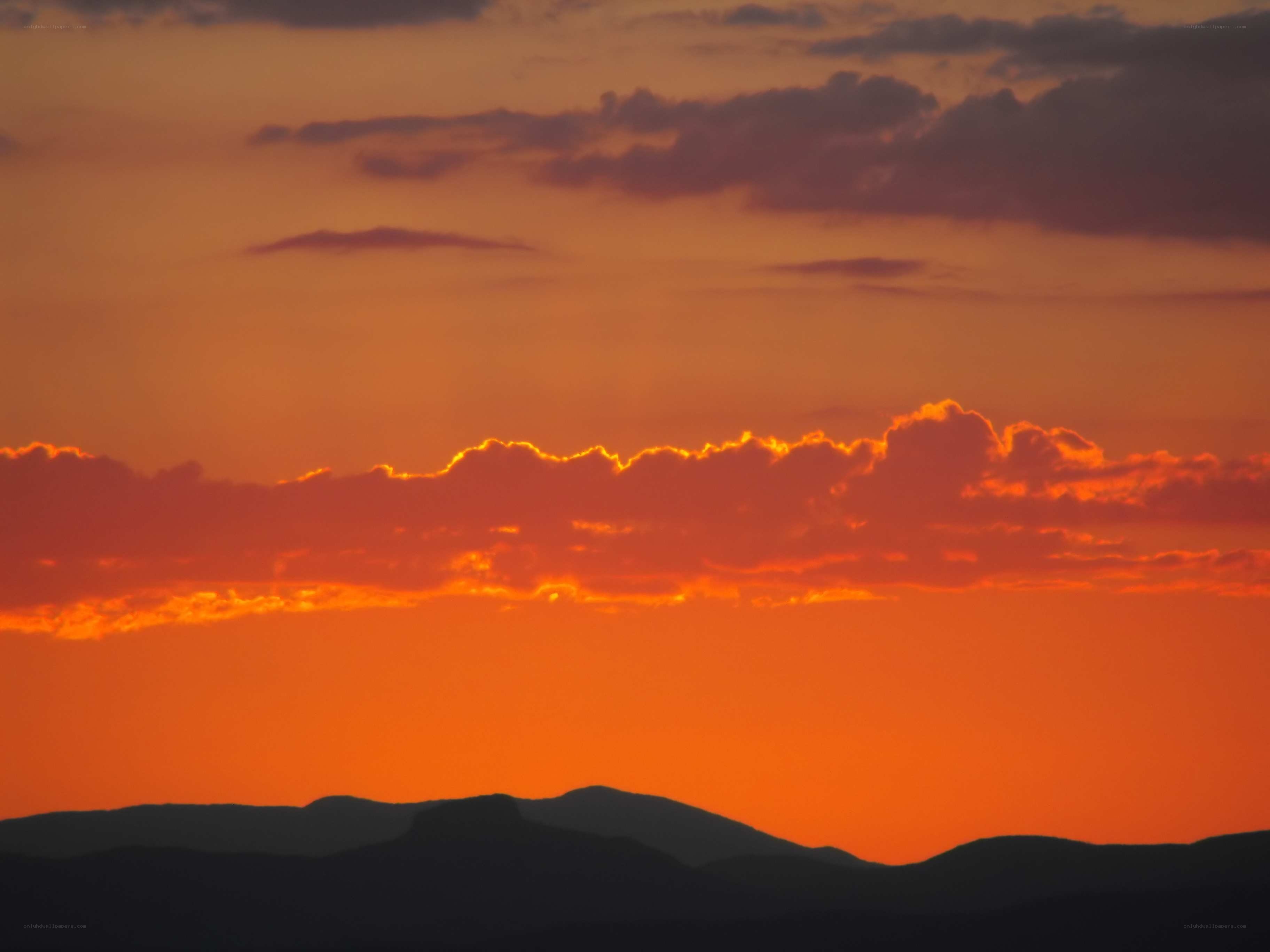Orange sunset over mountains