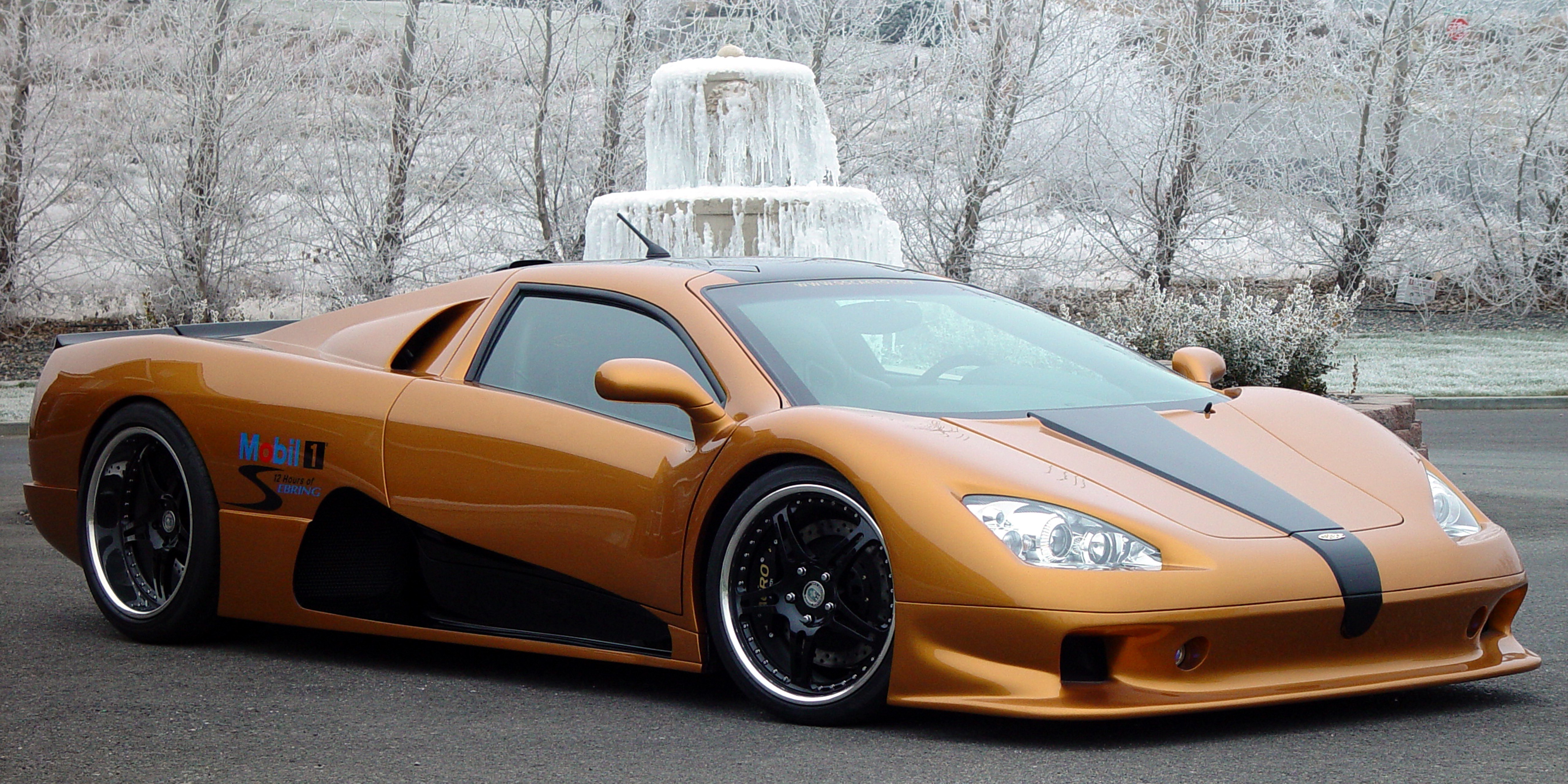 orange supercar in winter