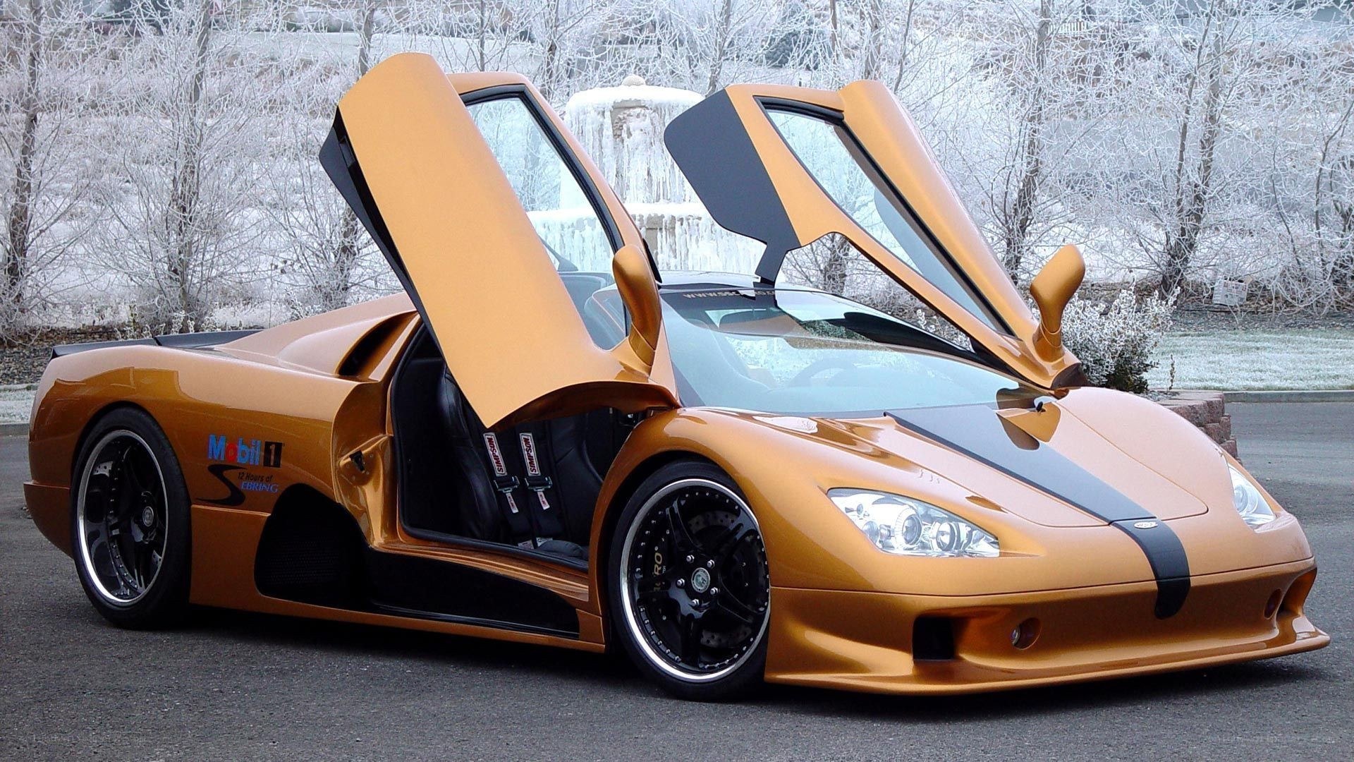orange supercar with open doors