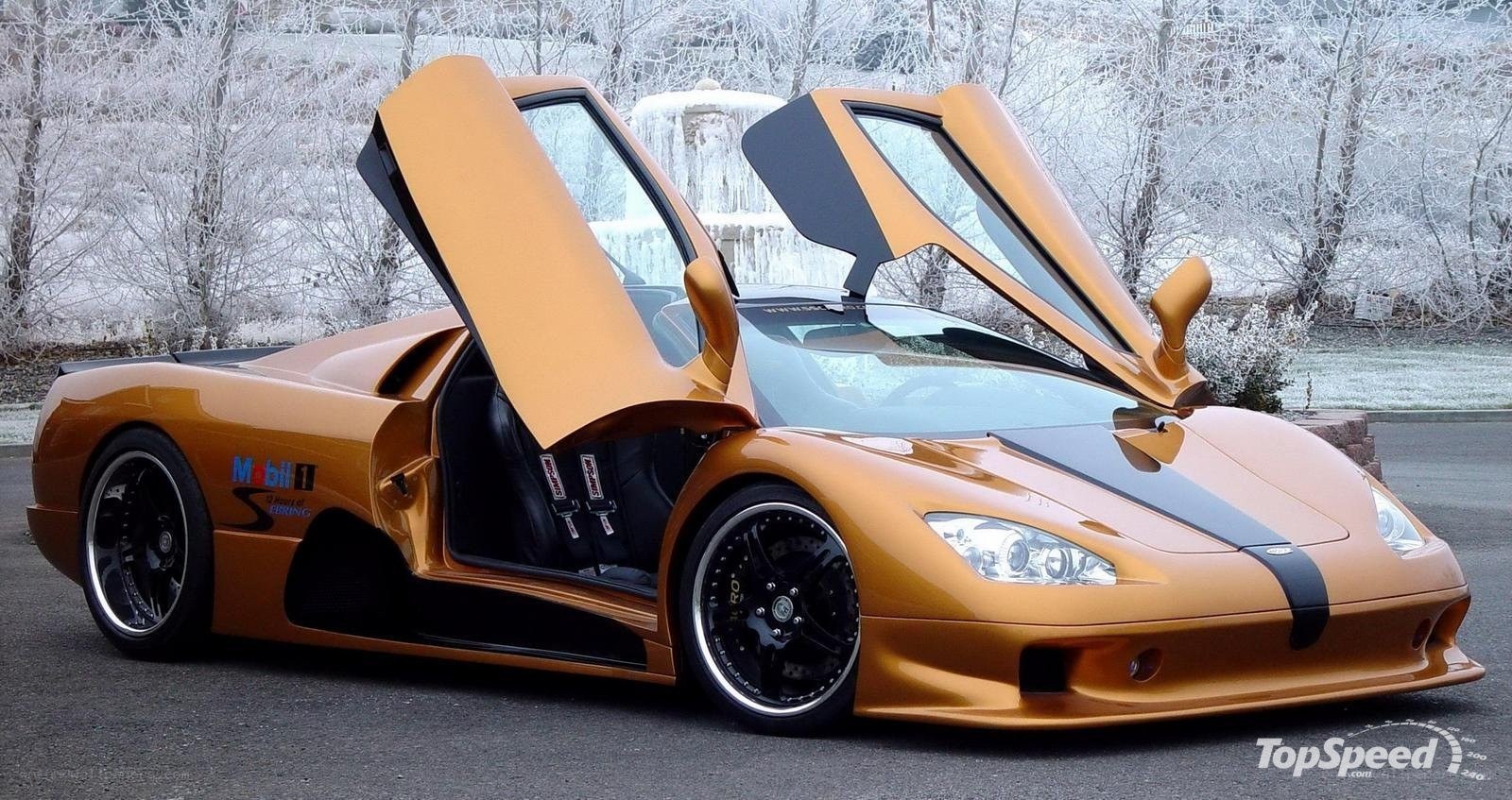 orange supercar with open doors