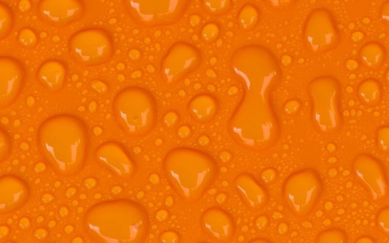 Orange Surface with Water Droplets