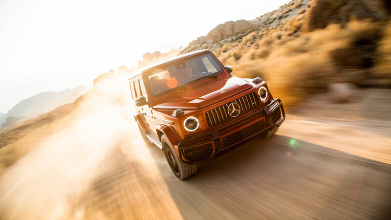 Orange SUV Driving