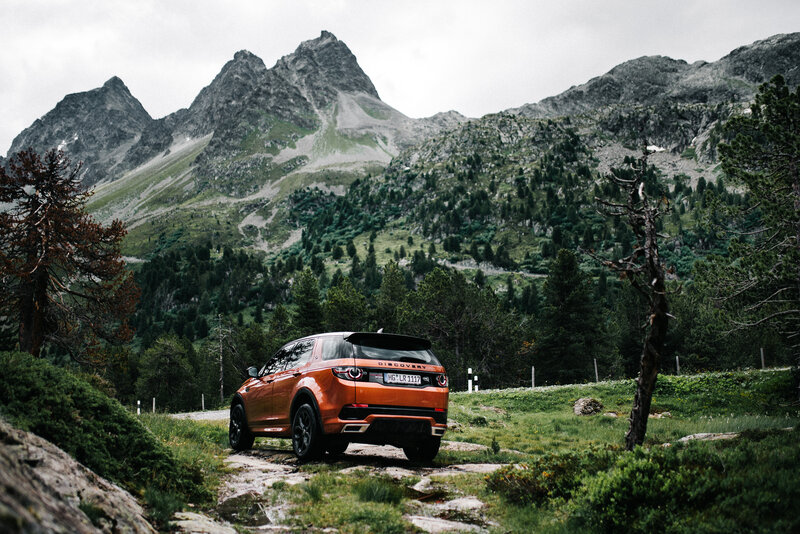 Orange Suv in Mountains