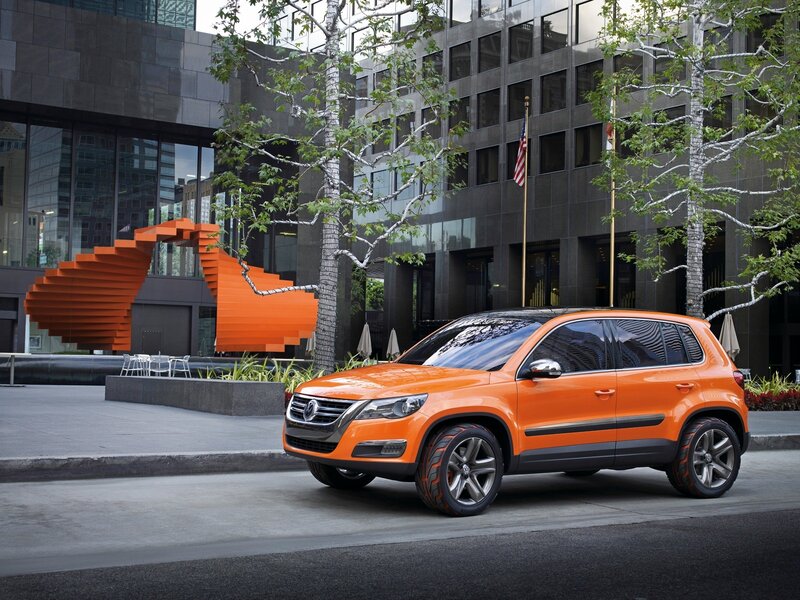 Orange SUV in urban setting