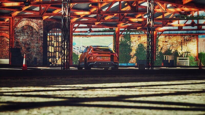 Orange SUV in Warehouse