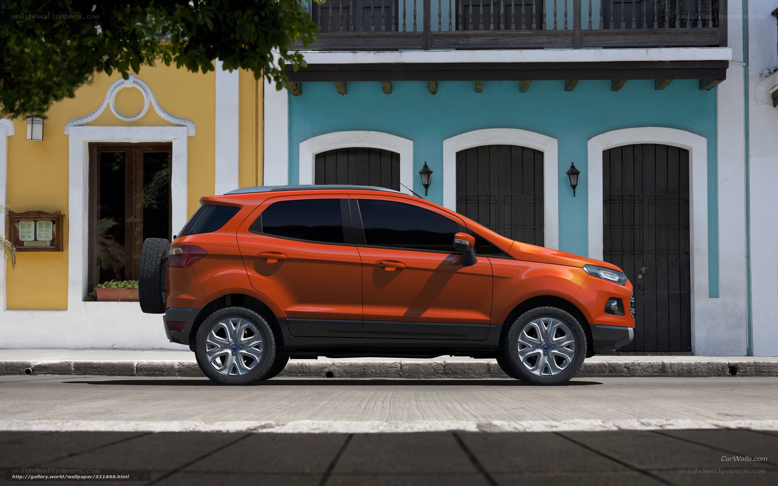 Orange SUV on a city street