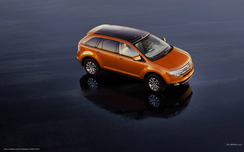 Orange SUV on reflective surface