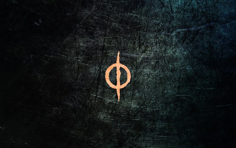 Orange Symbol on Dark Surface